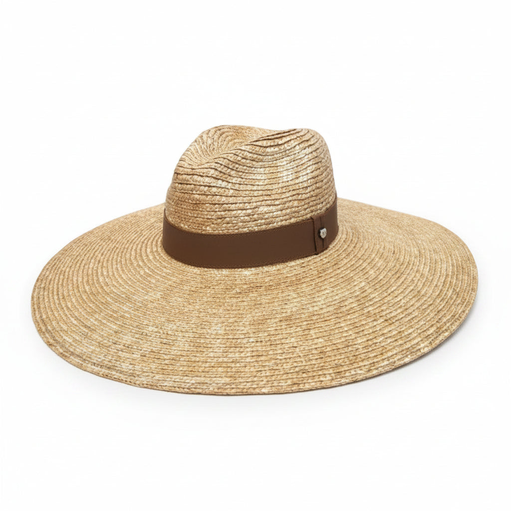Straw hat with a brown band on a gray background