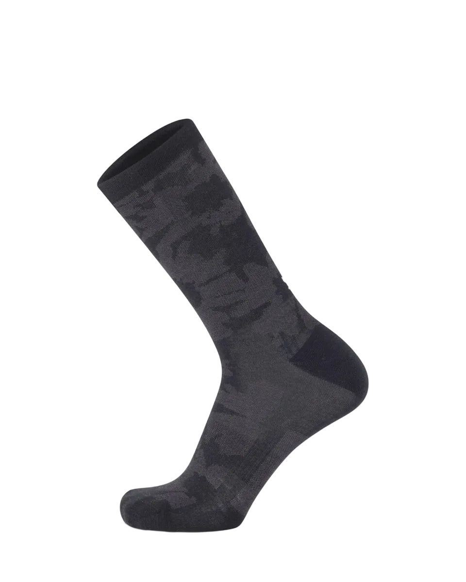 Black sock on a light gray background