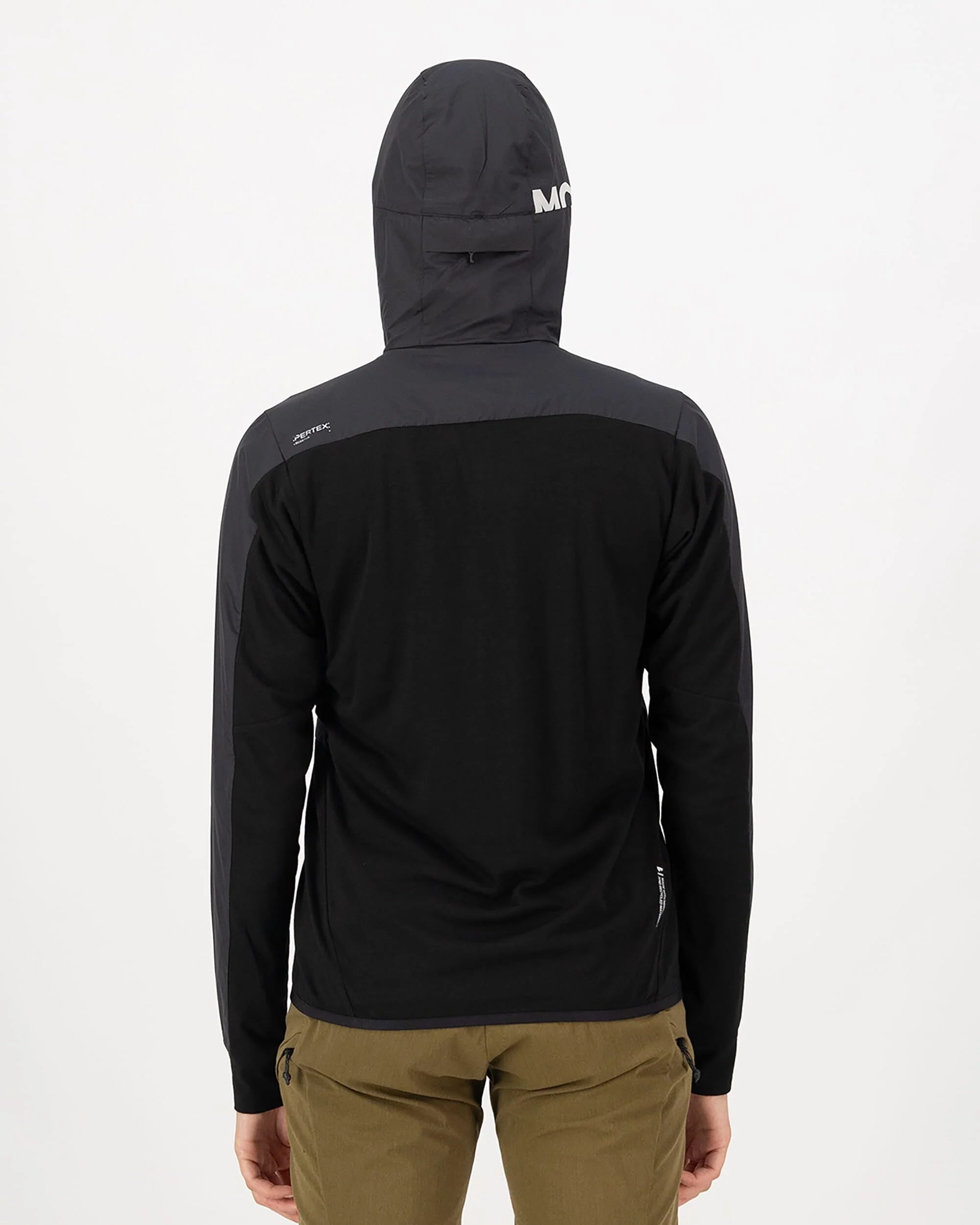 Person wearing a black hooded jacket with a visible brand logo on a white background