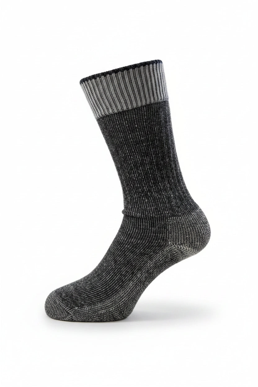 Gray sock with a ribbed texture on a white background