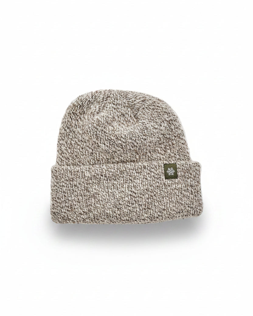 Textured beanie with Norsewear logo on a light gray background
