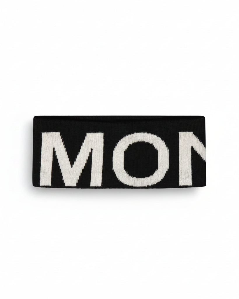 Black headband with MONS branding on a white background