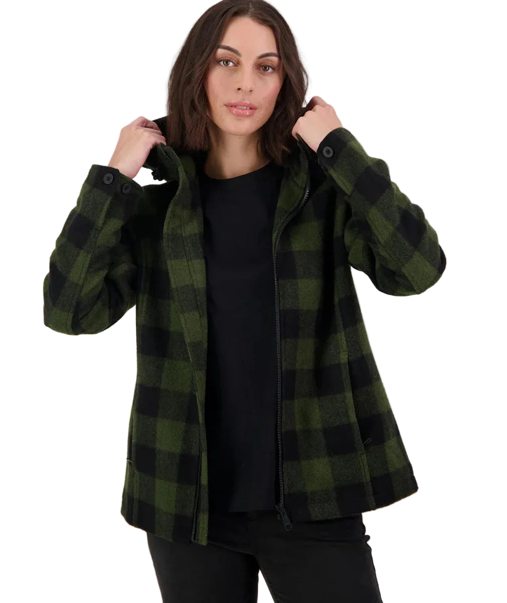 Woman wearing a green and black checkered jacket on a white background